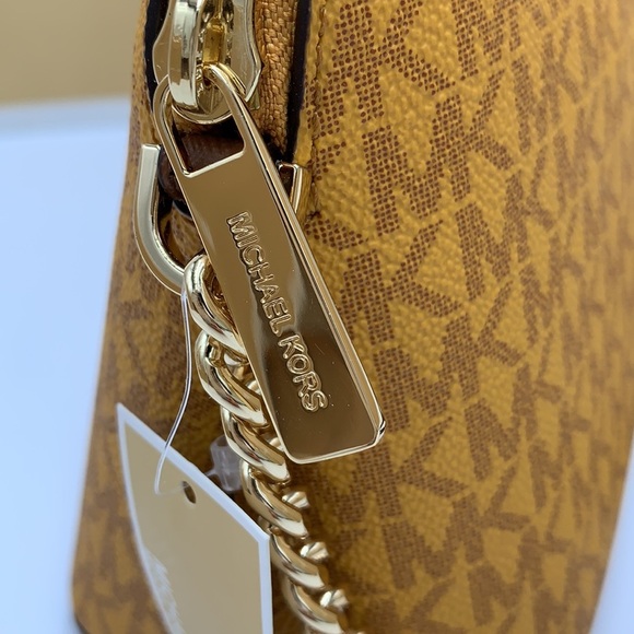 Michael Kors Medium Dome Xcross Xbody Bag
Color: Marigold Multi - Picture 9 of 15